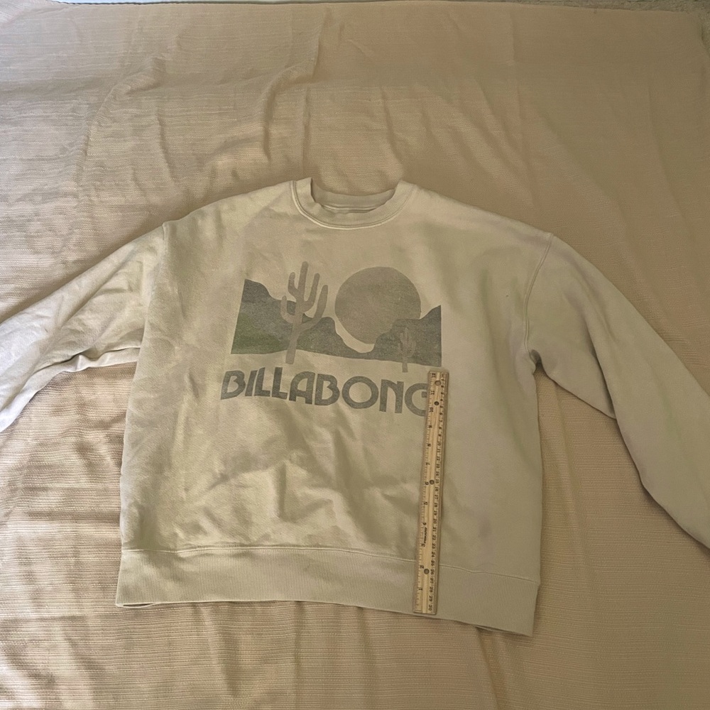 Billabong sweater! Worn out a little, but in fair condition!